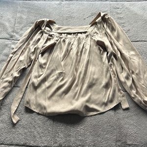 Tan blouse with tie in back